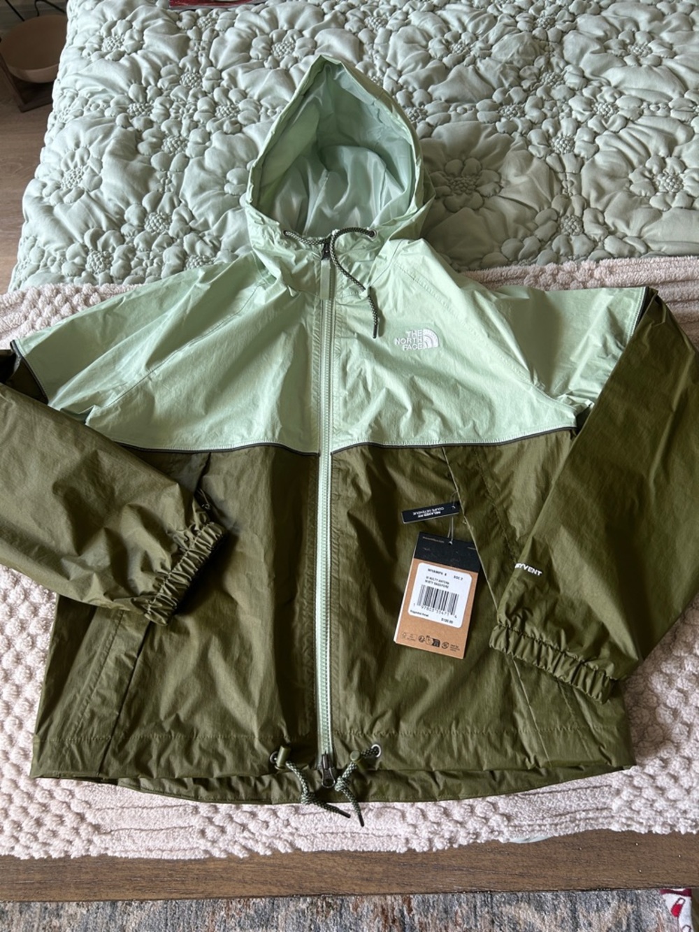 The North Face  Two-Tone Hooded Rain Jacket in Light Sage and Olive